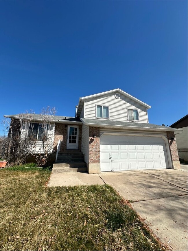 Photo - Spacious 5-Bed Clearfield Home with Garage & Fenced Yard