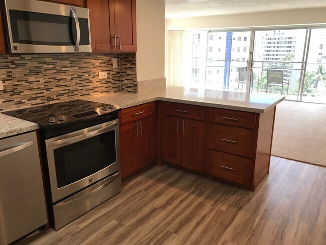Photo - Waikiki! Marina Towers-Large, 2 Bdrm., 1.5 bath, cov'd pkg./washer/dryer in apt.