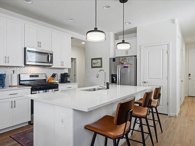 Photo - Spacious 4-Bedroom Home with Modern Features & EV Charging!
