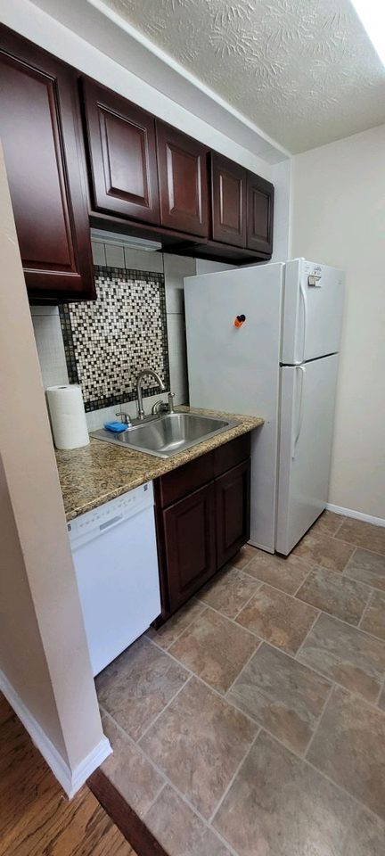 555 W Glenn Ave Unit Village Green Apartment