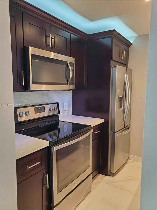 Building Photo - 8160 Geneva Ct Unit 303