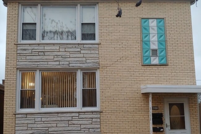 front of the house. Garden Basement Apartment - 6313 W Montrose Ave Unit 1st