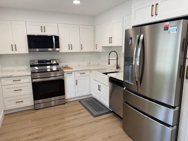 Photo - 4261 W Palm Aire Dr Unit 202