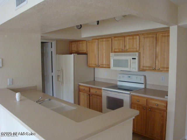 Building Photo - 10075 Gate Pkwy Unit 2109 Rental