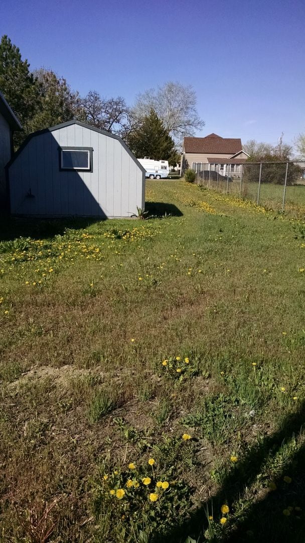 Photo - Small Living with Large Garage