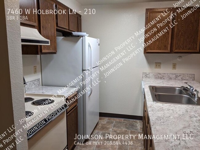 Building Photo - 7460 W Holbrook Ln Unit 210