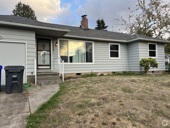 House with attached garage and driveway - 6920 N Macrum Ave Rental