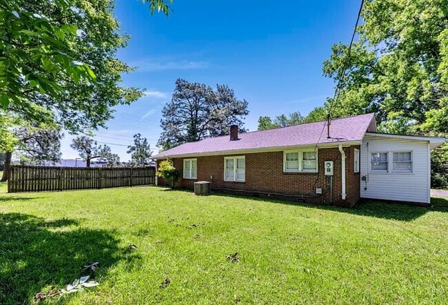 Photo - 4 bedroom 2 Bath - Available Now on Main A...