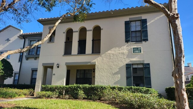 Building Photo - Come see this modern, elegant condo in Celebration! Unit 206