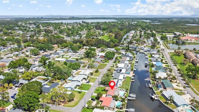 Photo - Waterfront Living with Pool – Fully Furnished & Turnkey! | 3bed | 2bath