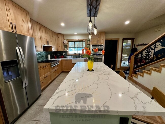 Building Photo - Beautiful Home on the Creek in Glenrock! - Summer pool in complex!