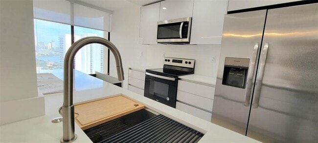 Building Photo - 19355 Turnberry Way Unit 23F Rental
