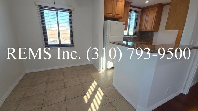 Photo - Refurbished Upstairs Apartment with Garage parking Unit 9034