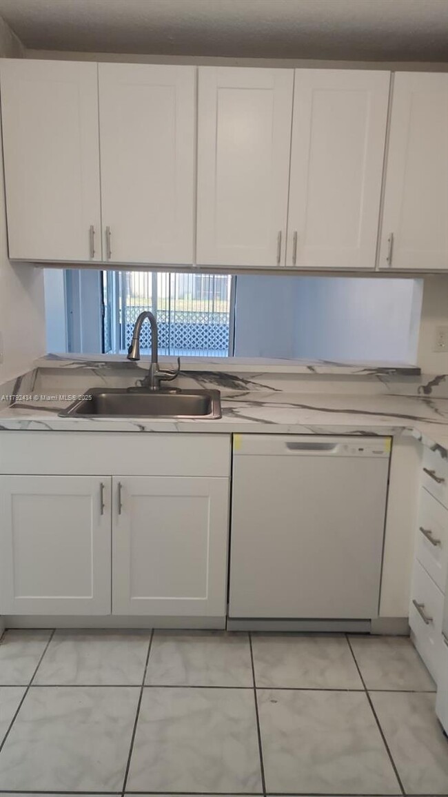 Photo - 3199 Foxcroft Rd Condo Unit 108