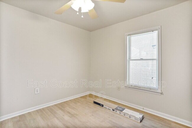 Photo - 2 Bedroom, 1 Bath, Central Air Conditioning, Washer Dryer in unit.