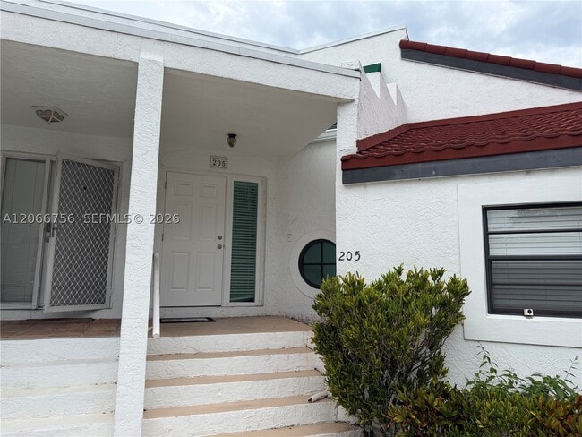 Building Photo - 205 NW 36th Ave Unit 205