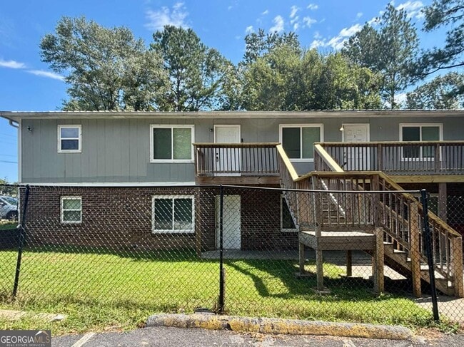 Building Photo - 6077 Pine St Unit 4 Rental