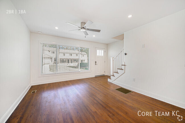 Building Photo - Renovated 2 Bed + Den Townhome in South Plaza Unit 5020