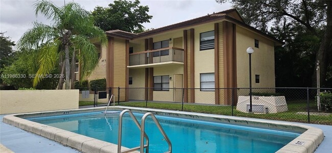 Building Photo - 11323 Royal Palm Blvd Unit D-2