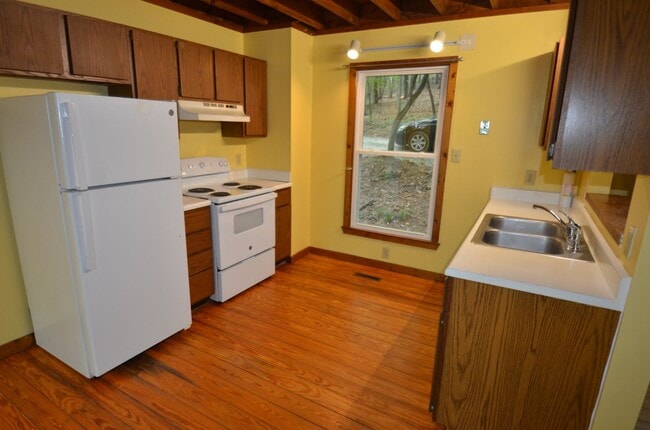 Photo - Private Wooded Retreat Near UNC with Vaulted Ceilings & Cozy Woodstove