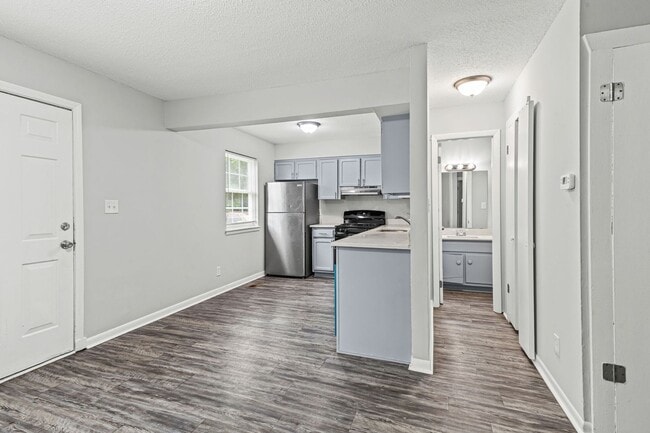 Photo - Summer Special! Updated 3BR Townhome with Basement + $250 Off First Month’s Rent