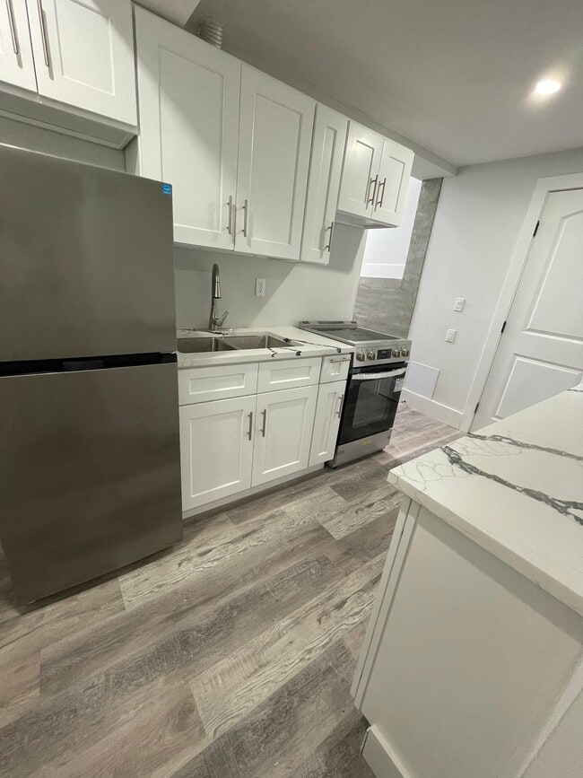 Building Photo - 1299 Brunswick Ave Unit 2