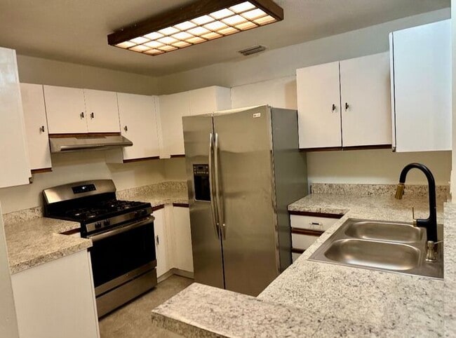 Photo - 3 Bedroom 2 Bath Winter Garden Townhome with Remodeled Kitchen and a Fenced Backyard!
