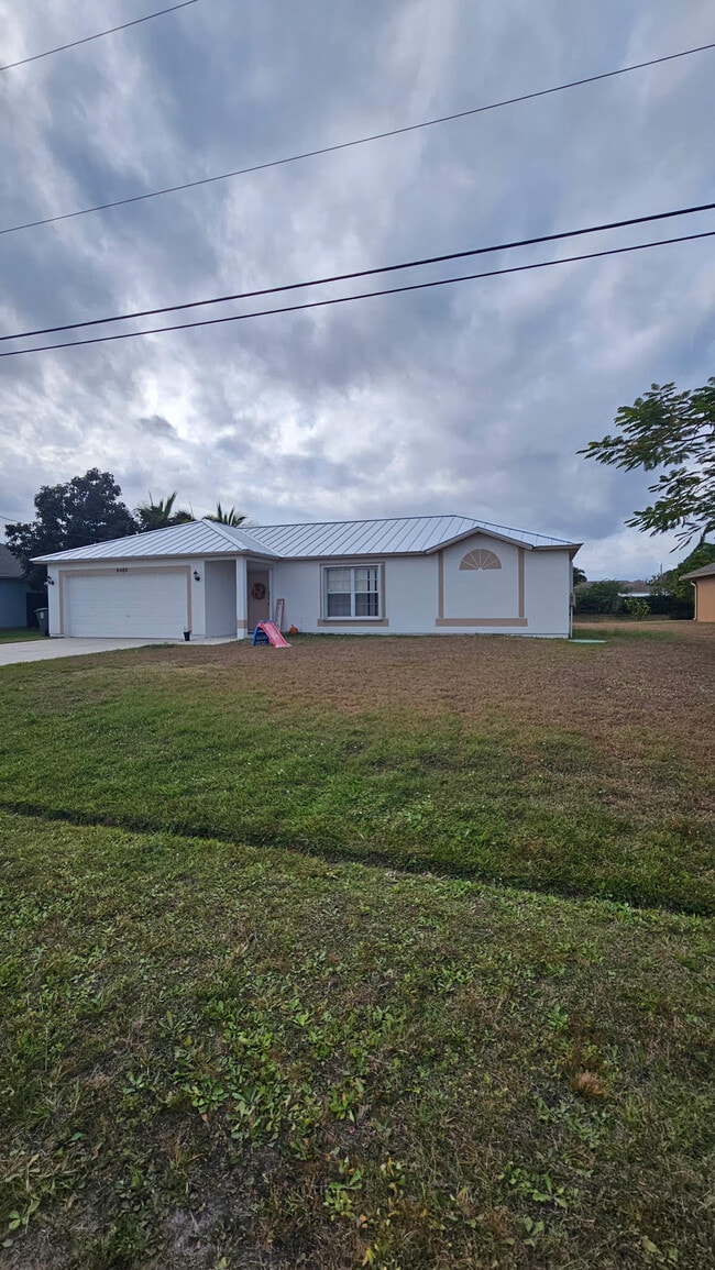 Building Photo - 6480 NW Volucia Dr