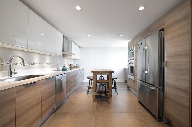 Building Photo - 9940 W Bay Harbor Dr Unit 5C-S