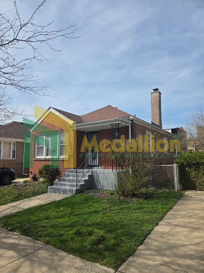 Photo - Spacious 4-Bedroom Home with Finished Basement and Yard Space