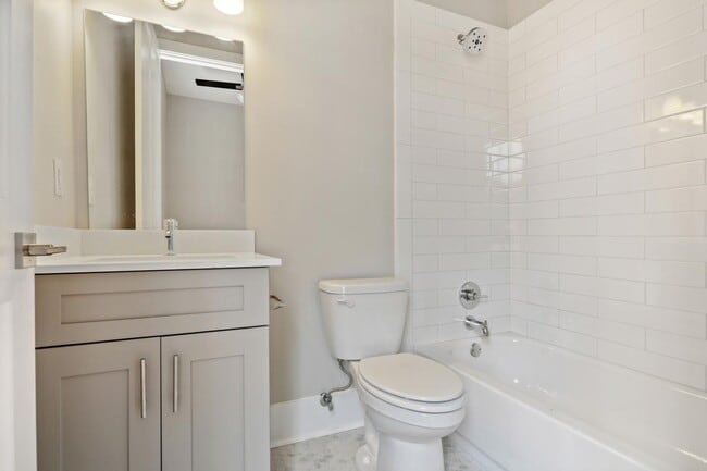 Photo - Historic Garden District Renovation with Front Balcony one block to St. Charles Streetcar! Unit 202