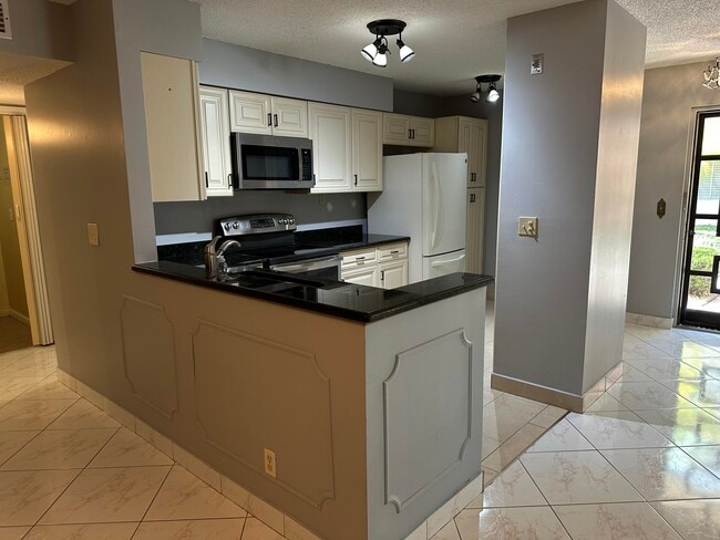 Building Photo - 14905 Wedgefield Dr Unit 101 Rental