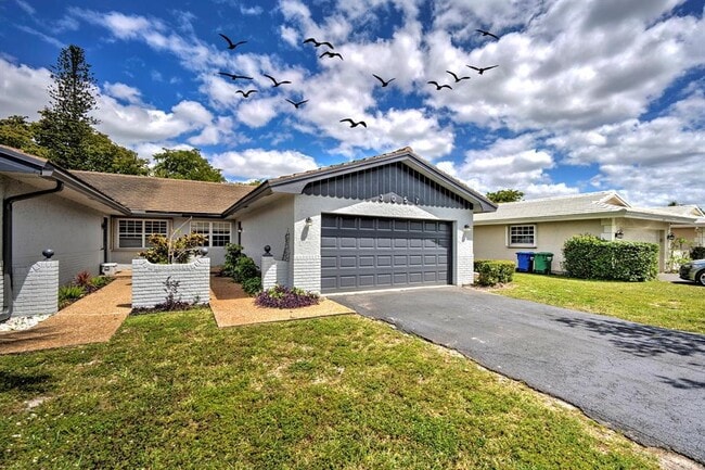 Building Photo - 3057 NW 103rd Ln