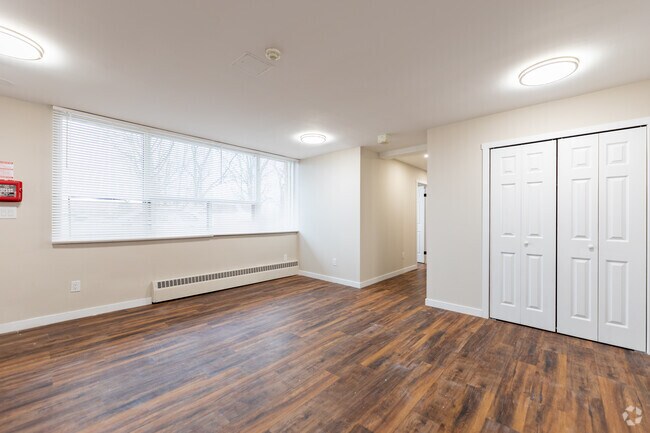 2BR, 1BA - 784SF - Living Room - 11 Kendale Court Apartments