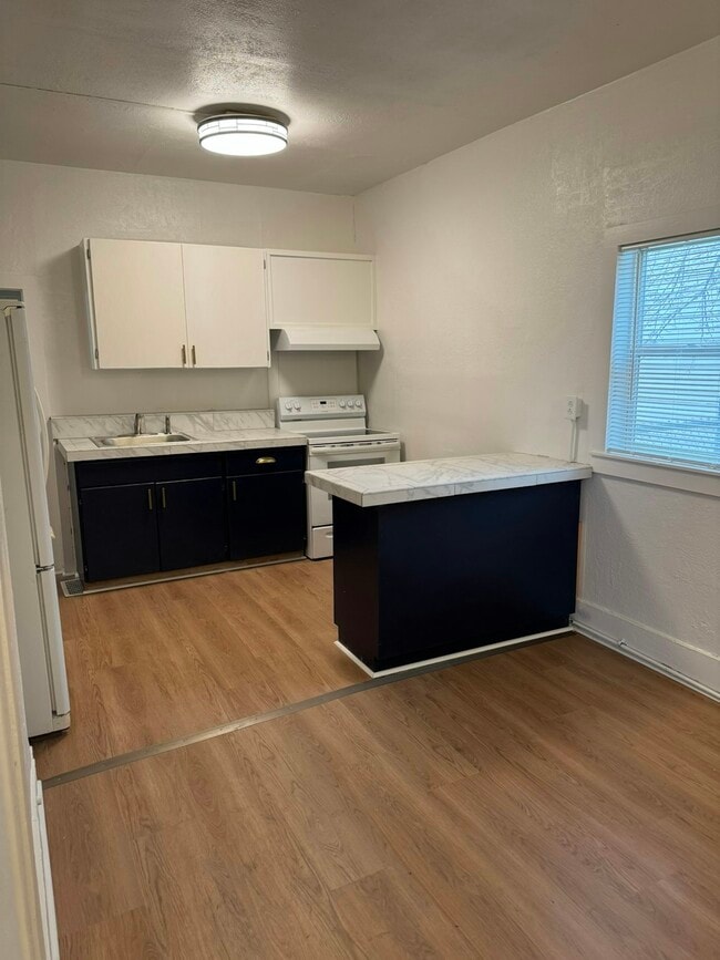 Building Photo - 2203 W Mallon Ave Unit 1