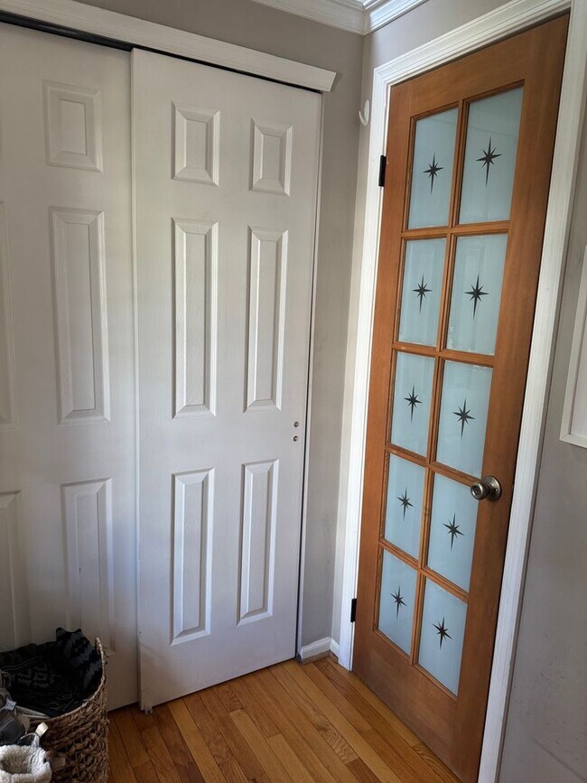 Photo - Stunning 3–4 Bedroom Townhome in Private Community | Garage + EV Charger | Deck with Tree Views
