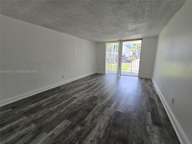 Building Photo - 484 NW 165th St Unit A-112