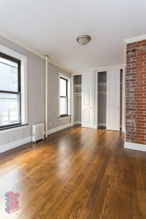 Photo - 336 E 18th St Apartment Unit B1