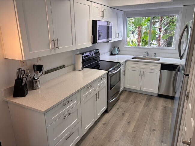 Photo - Furnished Beachside Townhome 2 bedroom/ 1.5 bath Dog Friendly Walk to beach