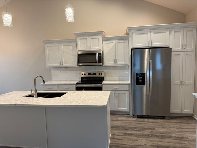 Photo - Beautiful brand-new ranch townhome with 2 ...