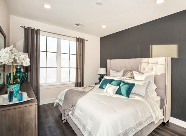 The king-size bed, nightstand, and dresser, fit perfectly in our large bedrooms - Waldwick Station