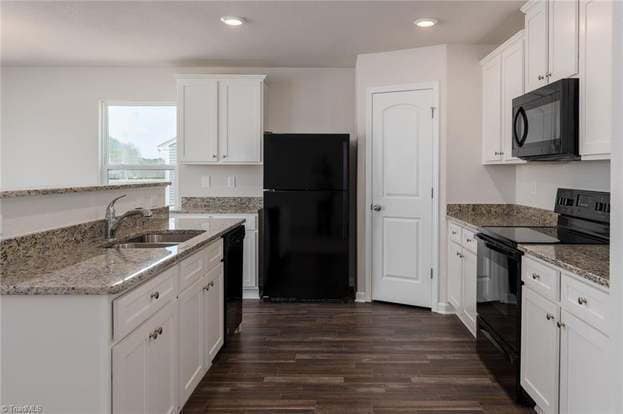 Photo - Spacious 3-Bedroom + Loft Home in Meredith Woods – Stylish, Efficient, and Perfect for Entertaining!