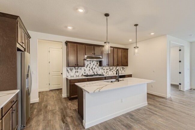Photo - Beautiful two-story home with a walk-out finished basement is for the perfect family home