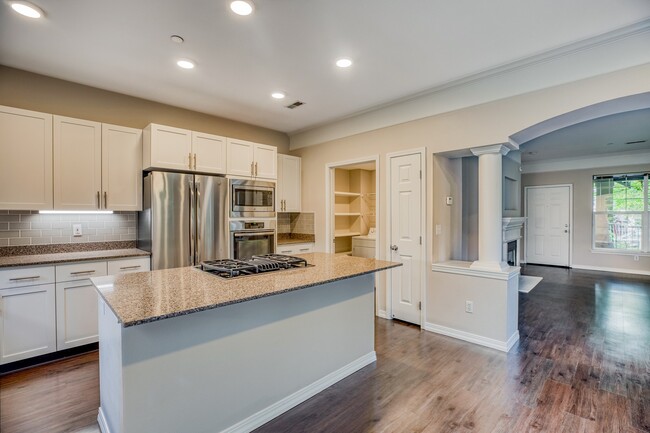 Expansive kitchen island in select homes - The Estates at Cougar Mountain Apartments