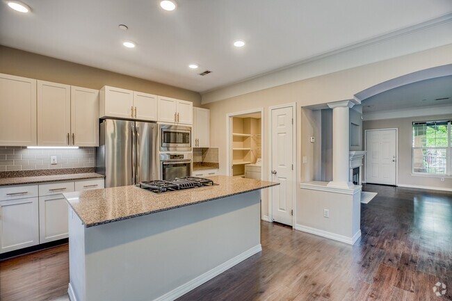 Expansive kitchen island in select homes - The Estates at Cougar Mountain Rental