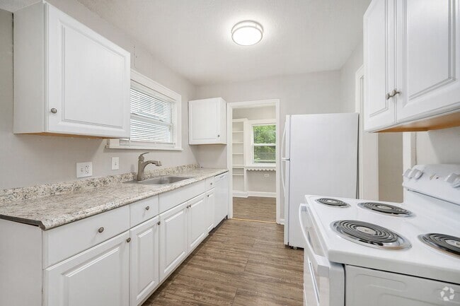 Building Photo - 2-bedroom, 1-bathroom duplex is located in... Rental