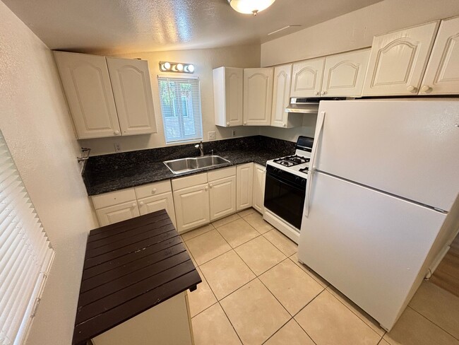 Photo - Charming 2Bed/1Bath apartment W/ Private front yard w/ porch and oversized backyard in Henderson