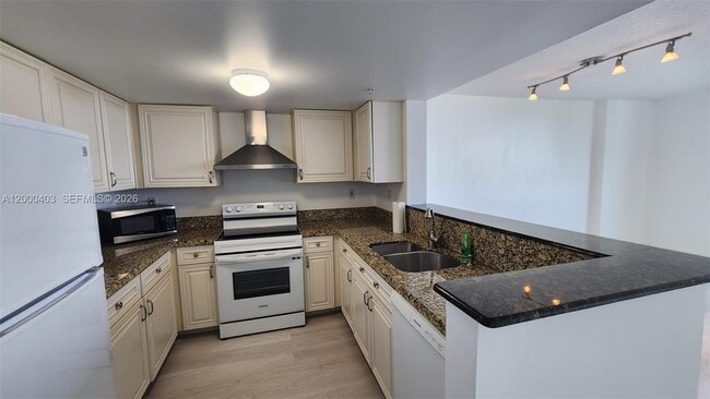 Building Photo - 3000 Coral Wy Unit 713