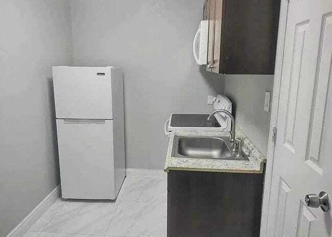 Building Photo - 1275 NW 58th Ave Unit 1 Rental