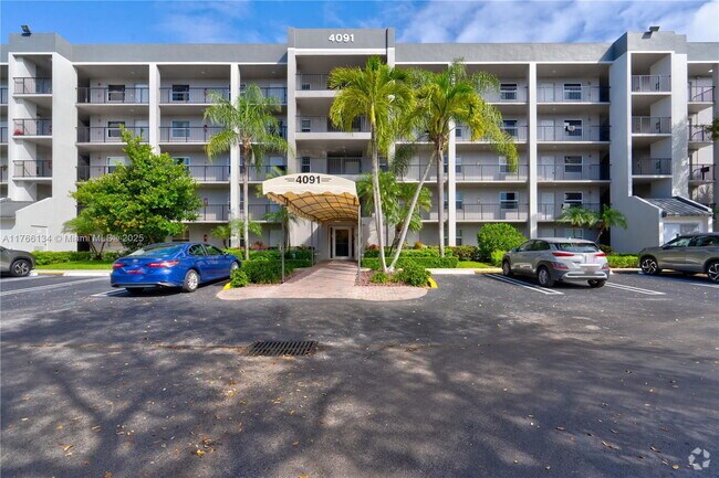 Building Photo - 4091 Cypress Reach Ct Unit 505 Rental